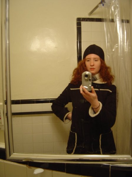 Before we left I took a bunch of photos of myself in Andy's bathroom, because I thought I looked cute. I don't look cute here, but I do match his bathroom pretty well.