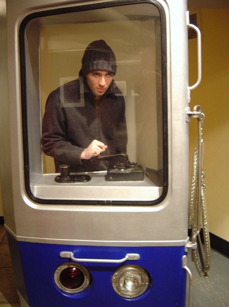 Andy is driving the subway! He didn't like that I got a piece of the rug in this photo, but whatever, like you really would have thought he was driving it anyway.